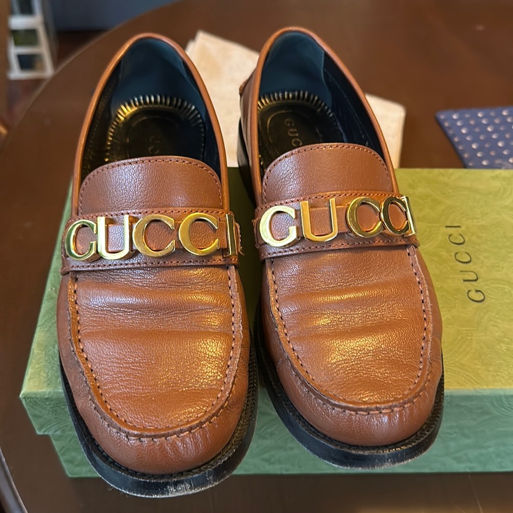 Cara logo-embellished textured-leather loafers -Brown
